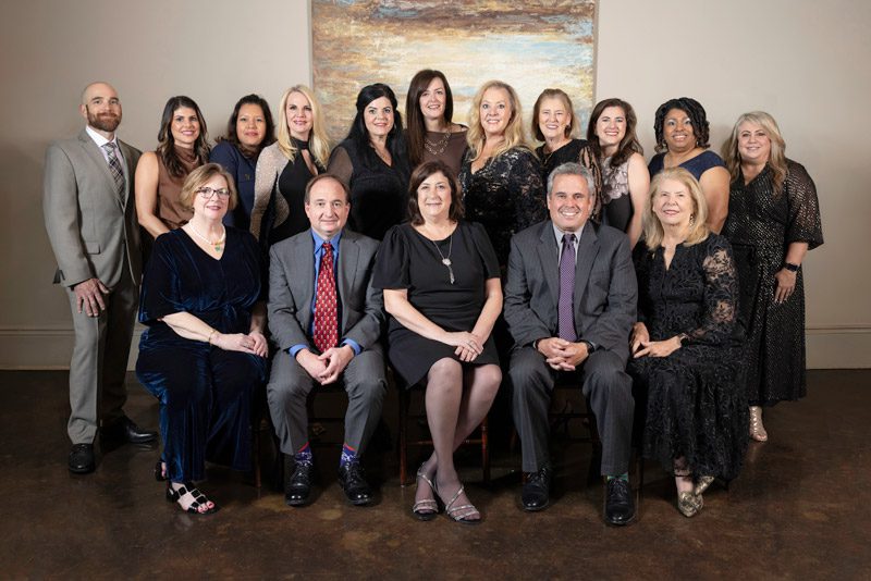 Group of people posing for a photo.