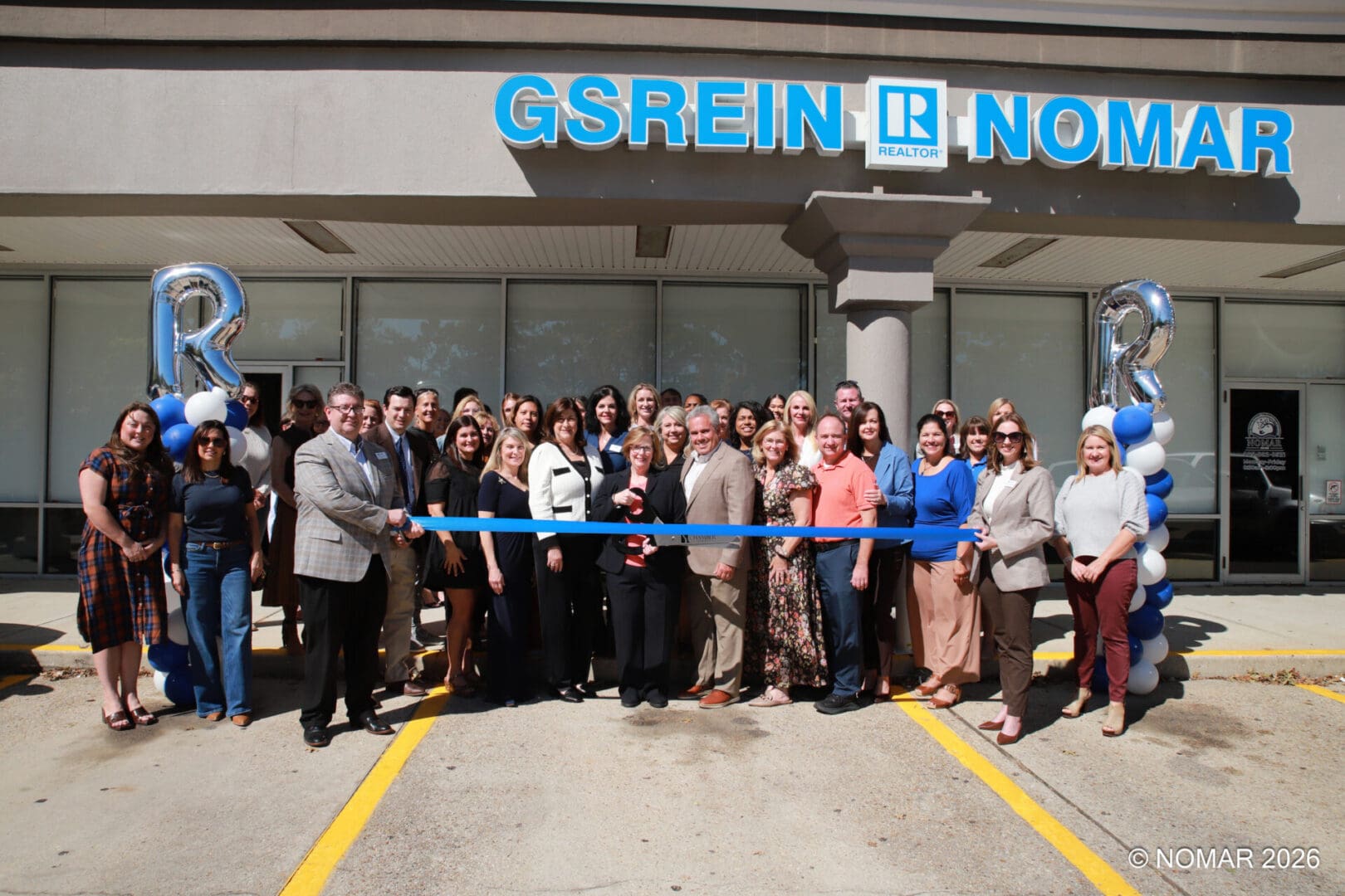 Featured image for “NOMAR Holds Ribbon Cutting for Remodeled Mandeville Office”