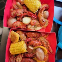 Crawfish boil with corn and potatoes.
