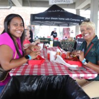 Two women enjoying a meal together.