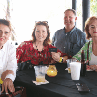 Group of people sitting at a table.